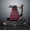 Vintage Electronic Device Classic Folding Camera With Red Bellows And Black Base