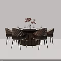 Elegant Round Dining Table With Quilted Leather Chairs Flower Vase And Wine Glasses