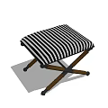 Stylish Stool With Black And White Striped Seat Cushion And Crossed Legs Design