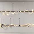 Modern Wavy Chandeliers Mounted On White Wall With Warm Light Design