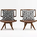 Two Wooden Frame Leisure Chairs With Woven Seats And Black White Patterned Cushions