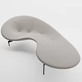 Modern Curved Light Green Sofa With Sleek Lines and Floor Lamp in Minimalist Interior