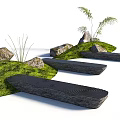 Natural Stone Landscape Seats With Green Grass Rocks and Plants in Garden