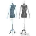 Two Black Mannequins Wearing Sequined Dresses With White Arms On Stands
