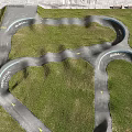 Road Facilities Design With Winding Roads Green Spaces Street Lights And Benches
