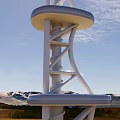 Modern Spiral Tower With Observation Deck Against Mountain And Blue Sky
