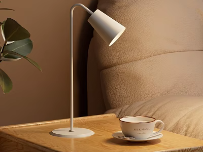 Modern White Desk Lamp on Wooden Table with Coffee Cup Brown Sofa and Green Leaves 3d model