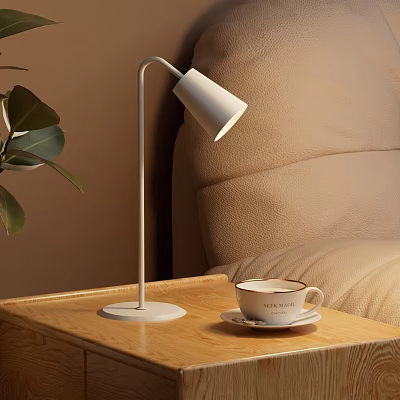 Modern White Desk Lamp on Wooden Table with Coffee Cup Brown Sofa and Green Leaves 3d model