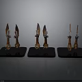 Decorative Bladed Weapons with Ornate Handles Arranged on Three Blue Display Bases
