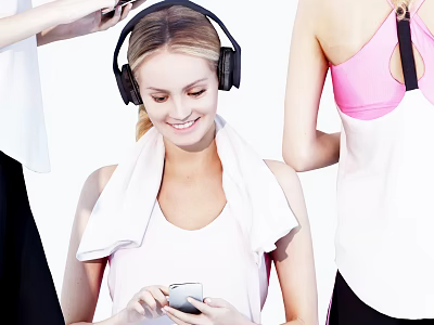 Woman in fitness attire wearing headphones with towel around neck holding phone 3d model