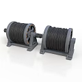 Two Black Industrial Cable Reels With Gray Bases And Metal Frames