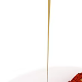 Delicious Yellow Sauce Dripping From White Plastic Spoon In Food Close Up