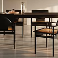 Modern Dining Table Set With Black Chairs Pendant Light Vase Plant In Sunlit White Room