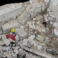 Rubble Pile With Gray Bricks Scattered Small Stones And Blue Green Debris