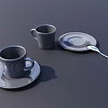 Two Gray Cups with Matching Saucers and a Spoon on Dark Background