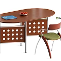 Oval Brown Dining Table with Blue Book Red Fruit Bowl Perforated Panel Beside Green Chair