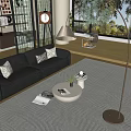 Modern Living Room Interior With Black Leather Sofa Decorative Pillows And Floor Lamp