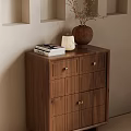 Modern Wooden Entryway Side Cabinet with Golden Handles Decorative Books White Candle Holder and Vase