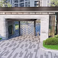 Modern Entrance Gate With Stone Walls Metal Grille Glass Doors And Green Plants