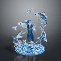 Blue and White Sculpture With Central Figure Surrounding Fish And Circular Patterned Base