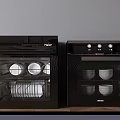 Black Kitchen Appliances Haier And Midea With Transparent Doors And Dishes Inside