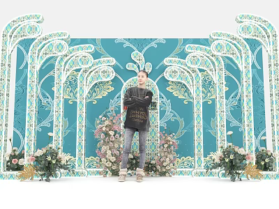 Person Standing In Front Of Turquoise Decorative Backdrop With White Floral Arch And Flower Decorations 3d model