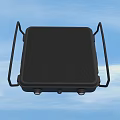 Portable Black Device With Handle Grid Surface Circular Knobs And Blue Sky Background