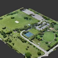 Aerial View of Park with Green Grass Trees Parking Lot and Basketball Court