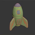 Green Rocket Toy With Blue Top Orange Fins And Round Window Design