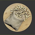 Fresh Peanuts Spilled From Burlap Sack On Round Wooden Plate
