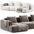 Light and Gray Sectional Sofa With Soft Pillows And Cozy Throw Blankets