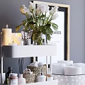 Stylish Bathroom Accessories Organized On Shelf With Towel Wicker Basket And Mirror