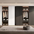 Modern Wardrobe Interior With White And Dark Cabinetry Hanging Clothes Shelves Wooden Floor And Rug