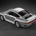 Silver Porsche Classic Sports Car With Sleek Body Design And Brown Leather Interior