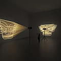 Creative Decorative Projection Lighting with Artistic Silhouette Designs in Indoor Display Setting