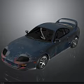 Blue Sports Car with Rear Spoiler Black Windows Silver Wheels and Glossy Sleek Body Finish