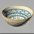 Cream Ceramic Bowl With Yellow Rim And Blue Floral Geometric Patterns