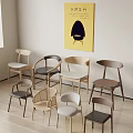 Modern Dining Chairs in Various Designs Against Light Wall with Yellow Painting