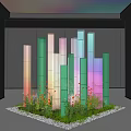 Indoor Landscape With Colorful Glass Columns Green Plants Flowers And Top Lighting