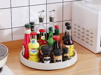 Organized Assorted Condiment Bottles On Rotating Tray For Modern Kitchen Countertop 3d model