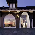 Traditional Chinese Storefront In Evening Featuring Wooden Panels Large Glass Windows And Eaves