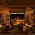Blooming Live Show Bar With Leather Seats Candles Warm Lighting And Stage