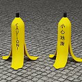 Decorative Ornament Set Of Yellow Banana Shaped Pieces With Caution Text And Chinese Warning Characters