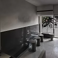 Modern Minimalist Café Interior With Gray Tones Staircase Bar Counter And Small Round Tables