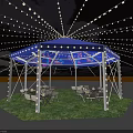 Outdoor Tea Break Area With Blue Canopy String Lights Grass Lawn And Tables Chairs