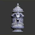 Blue And White Intricate Carved Urn Sculpture Featuring Cherub Designs And Ornate Patterns