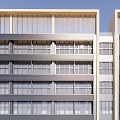 Modern High Rise Office Building With Glass Curtain Wall Large Windows And Surrounding Trees