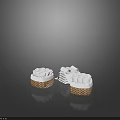 Neatly Rolled And Folded White Towels In Wicker Baskets For Bathroom Decor Essentials