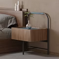 Wooden Bedside Table With Metal Frame And Vase Plant In Modern Bedroom