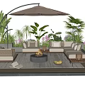 Outdoor Sectional Sofa with Arched Umbrella Fire Pit and Lush Garden Plants